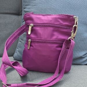 Travelon Magenta Crossbody Bag with Adjustable Strap and Matte Finish